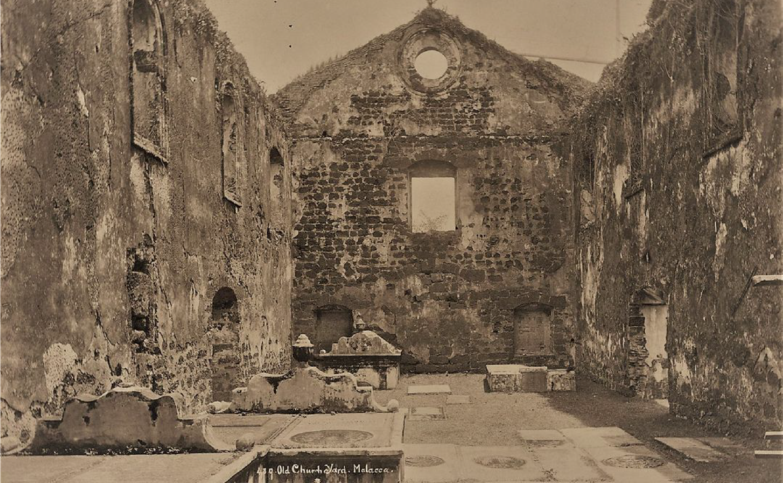 Graves & tombstones inside the ruins of St. Paul's Church circa 1920 (source: Melaka Dulu-Dulu)