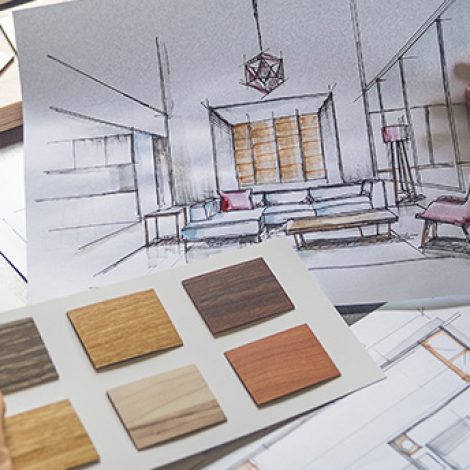 hands-holding-home-remodel-sketches-668x344